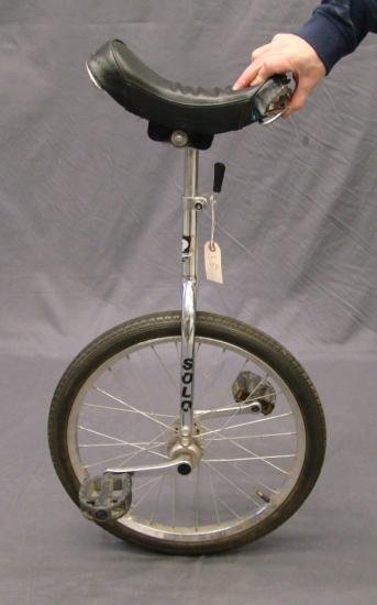 C. 1980's Quentin Solo Unicycle: C. 1980's Quentin Solo Unicycle. 18" Frame, good condition. Saddle ripped.