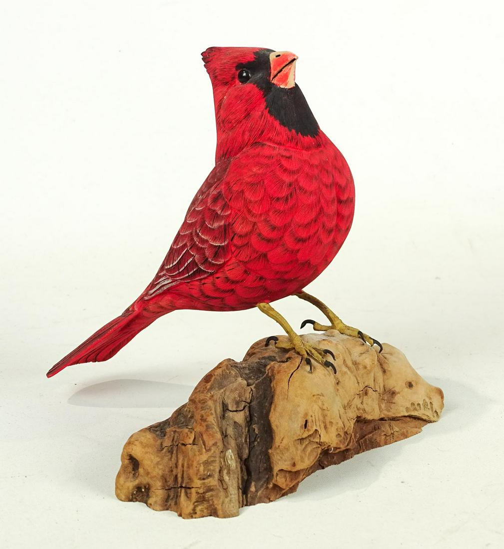 Bird Carving: Painted wooden bird carving. Marked underside "CARDINAL / CAPT. FRED HUHS / HAMPTON BAYS, NY / 98", 8" W., 8" Ht..