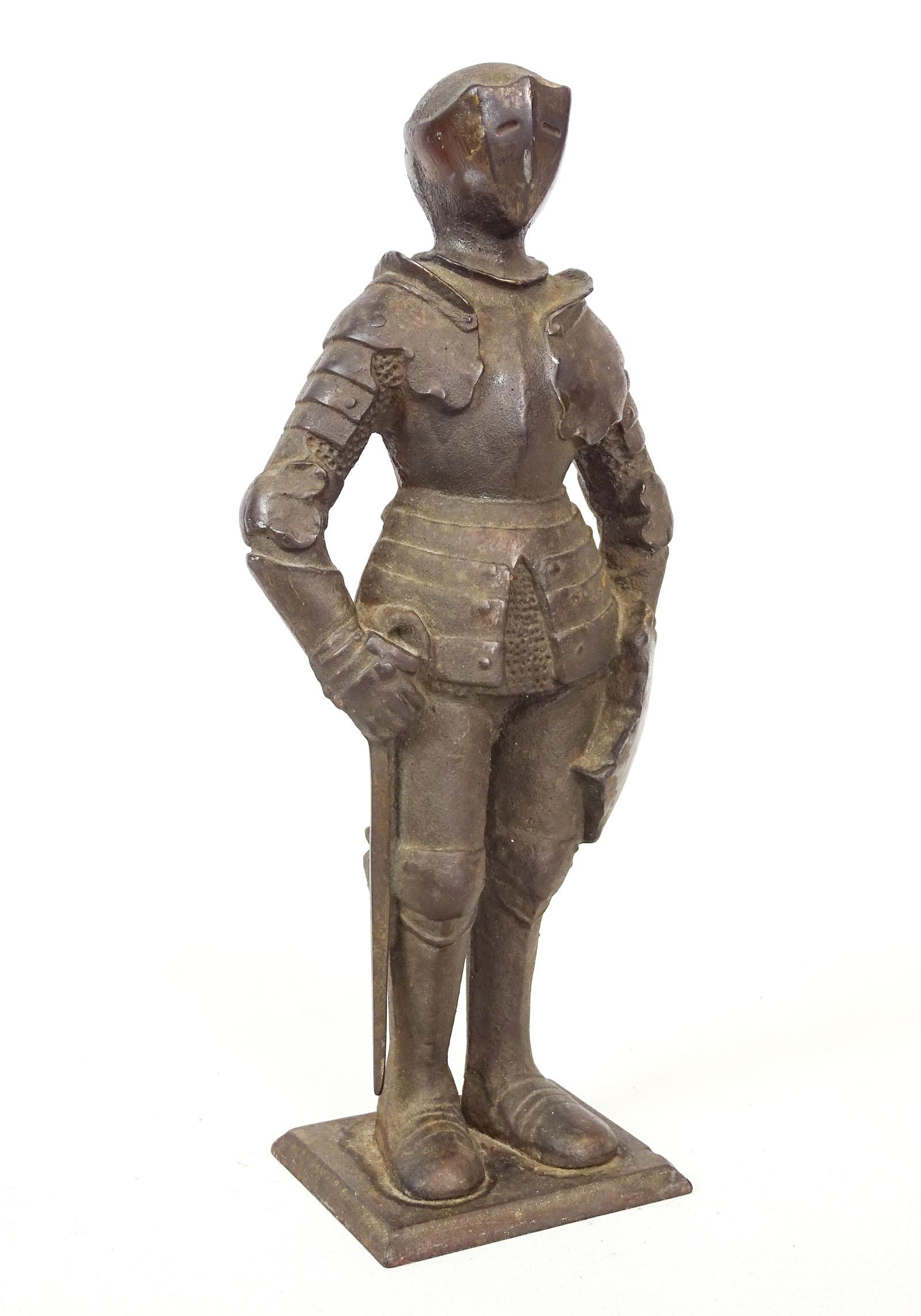 Doorstop: Cast iron Full Armor doorstop. 13 1/2" Ht.. MFG. "LVL".