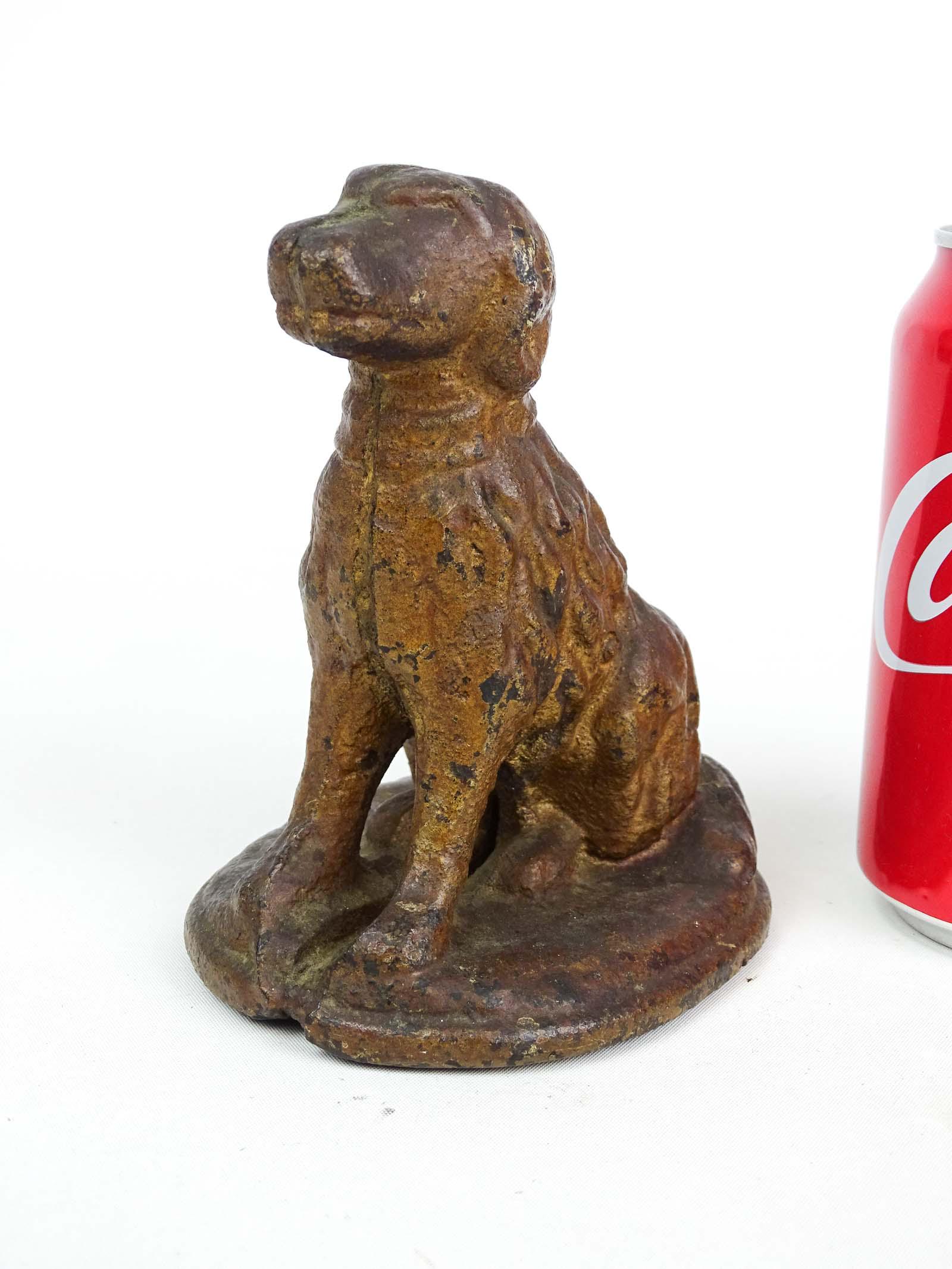 Doorstop: Cast iron Sitting Labrador doorstop. 5 1/4" Ht..