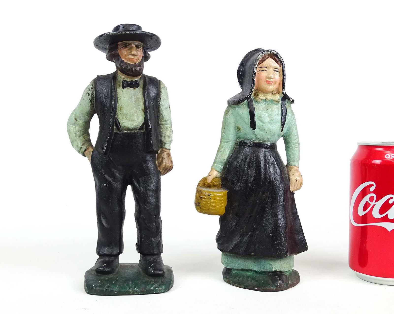 Doorstops: Pair of doorstops including cast iron Amish Man and Woman, 8 5/8" Ht., MFG. Wilton Products.