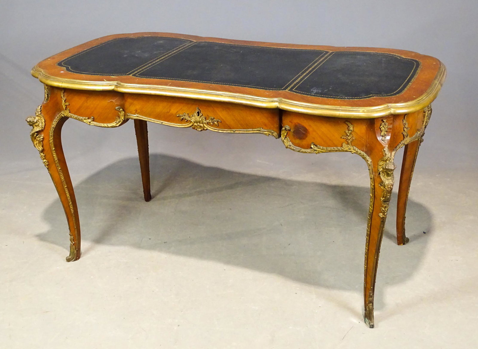 French Desk: French brass mounted desk. 56" x 29" x 31".