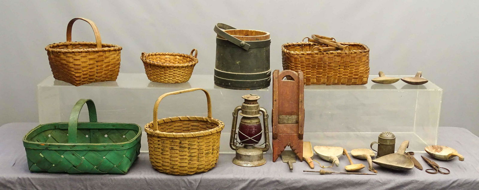 Primitive Lot: Primitive lot including early firkin in green paint, (5) early baskets (one in old green paint), Dietz lantern, slaw cutter, (2) pair shears, tin shaker.