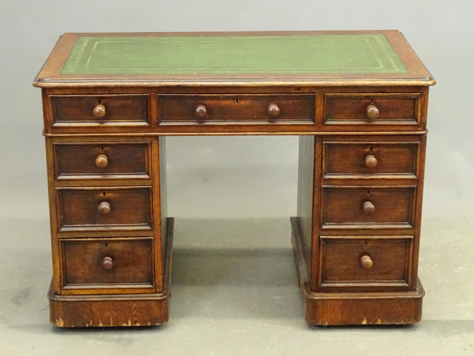 19th c. English Pedestal Desk: 19th c. English oak leather top three piece pedestal desk. 32" x 21" x 27".