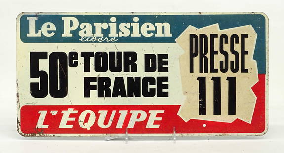 Tour De France Caravan Car Plaque: 1950 Tour De France Caravan metal car plaque. 9 3/4 x 19 1/2". Used by the Press Corps.. "Le Parisien / libere / 50 Tour De France / L' Equipe. Good original condition, shows use.