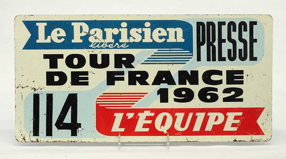 Tour De France Caravan Car Plaque: 1962 Tour De France Caravan metal car plaque. 9 3/4" x 19 1/2". Use by the Press Corps.. "Le Parisien / libere / Tour De France / 1962 / PRESSE / 114 / L' Equipe". Good original condition, shows use.