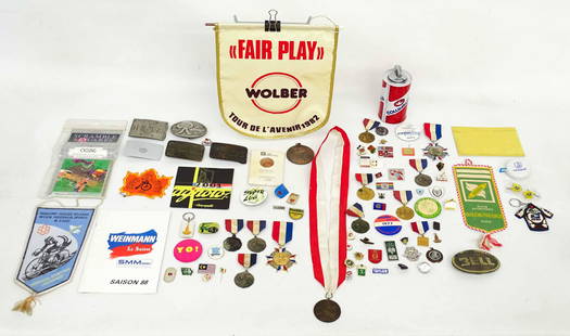 Misc. Lot: Misc. lot including belt buckles (BELL, Olympic Games, Lucky Beer), Wolber banner, racing medals, pinbacks etc..