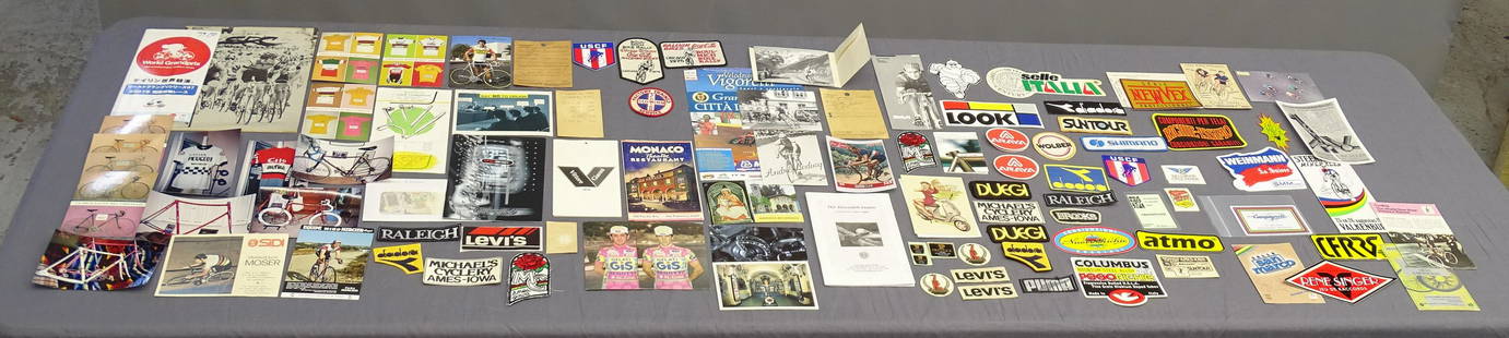 Bicycle Lot: Misc. binder of bicycle ephemera lot including pamphlets, stamps, patches, stickers etc..