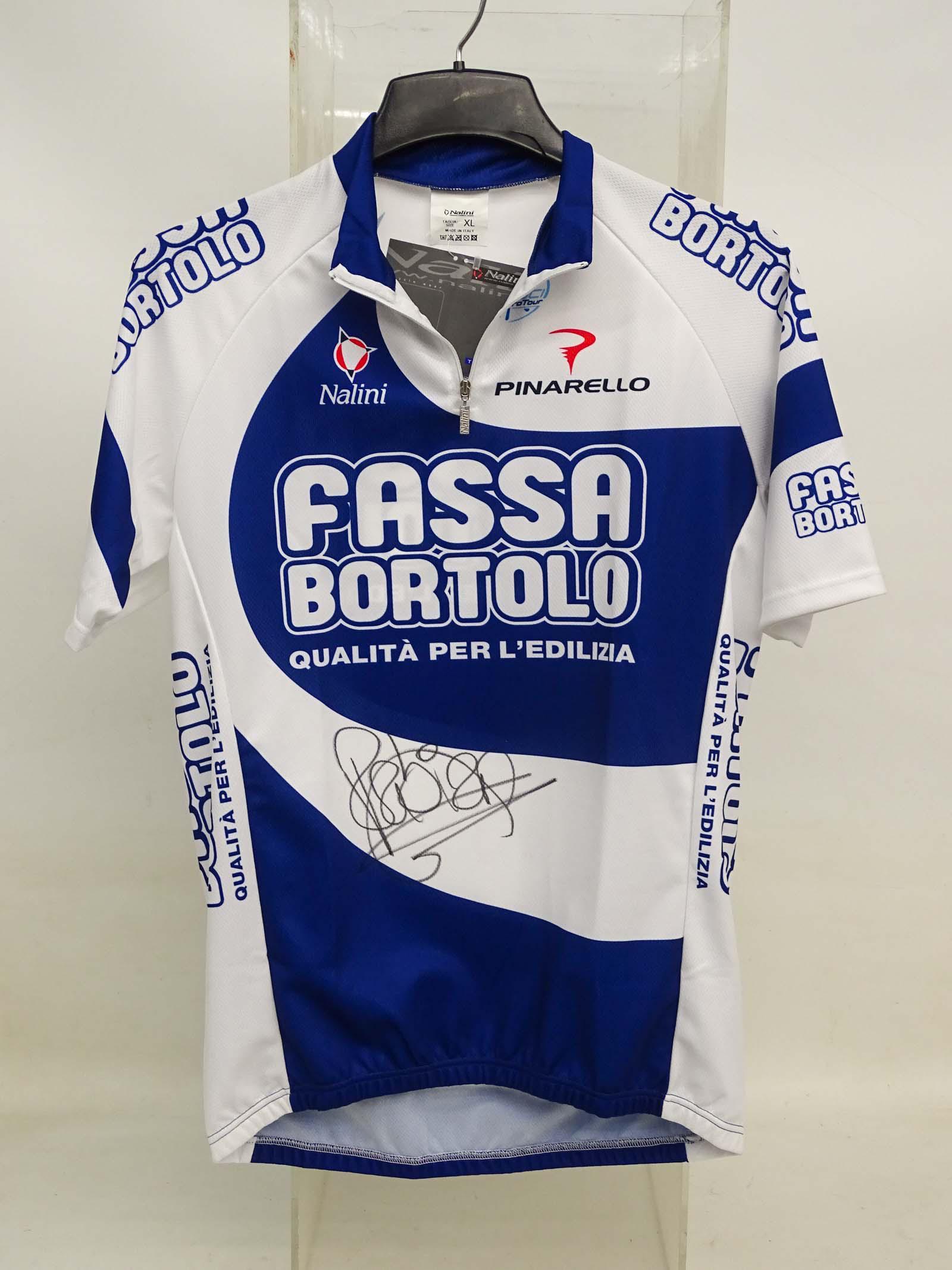 Fabian Cancellara Autographed Jersey: Fabian Cancellara race worn autographed Fassa Bartolo jersey. Success at the Tour de France include winning (8) individual stages 2004-2012, several World time trial championships. Good condition, unu