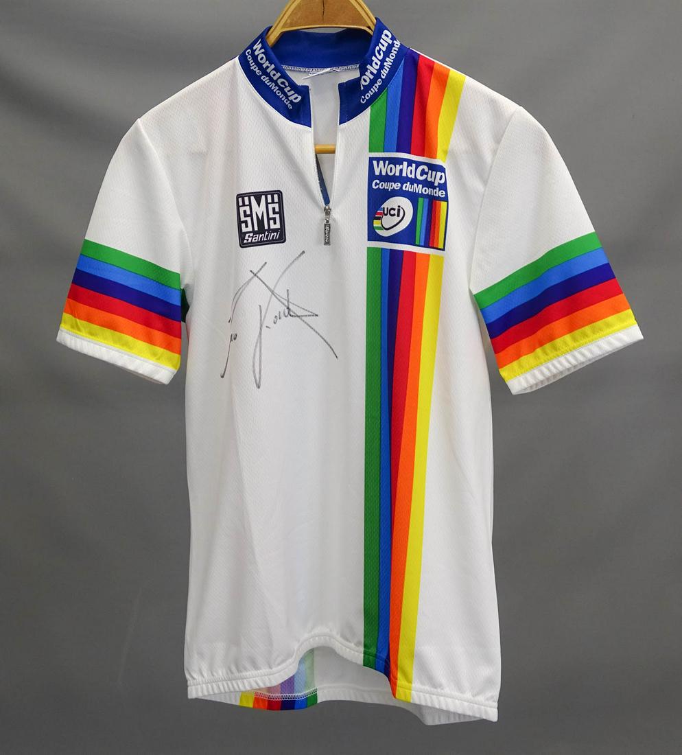 Maurizio Fondriest Autographed Jersey: Maurizio Fondriest race worn autographed World Championship Rainbow jersey. he won 1988, 91, 93 UCI Road World Championship and was very successful. Good condition, unused.