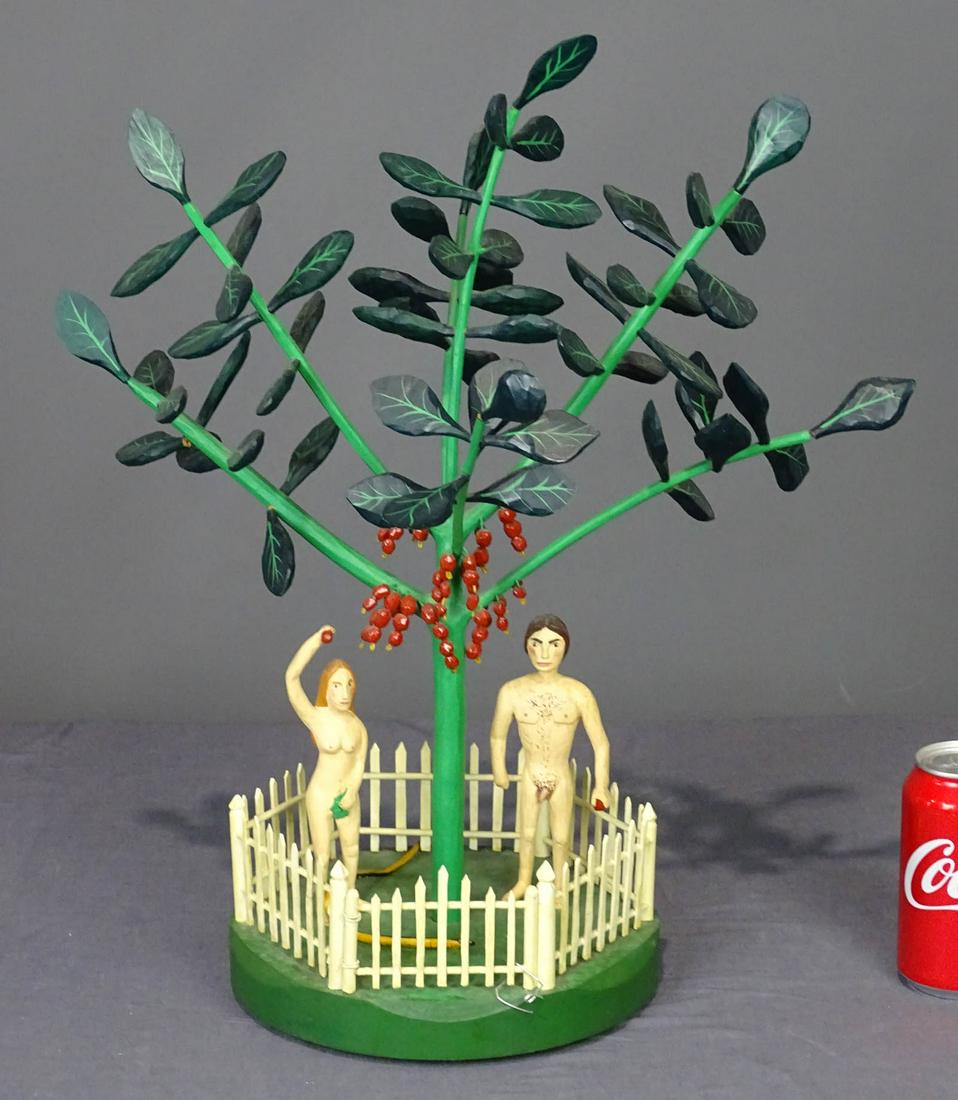 Folk Art Adam & Eve Carving: Folk art Adam & Eve tree of life carving. 20" Ht.. Provenance: Estate of Myron & Carolyn Neugeboren Ct..
