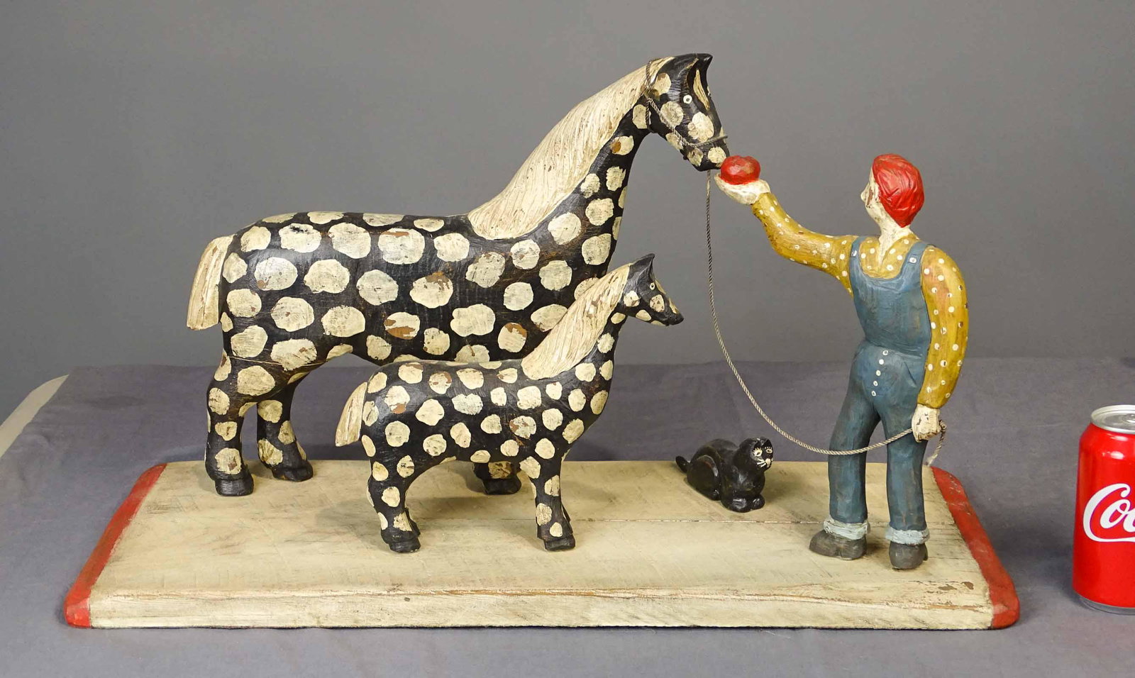Bruce Murphy Carving: Bruce Murphy folk art wooden painted carving of farmer with horses and cat. 24" x 10" x 15". Provenance: Estate of Myron & Carolyn Neugeboren Ct..
