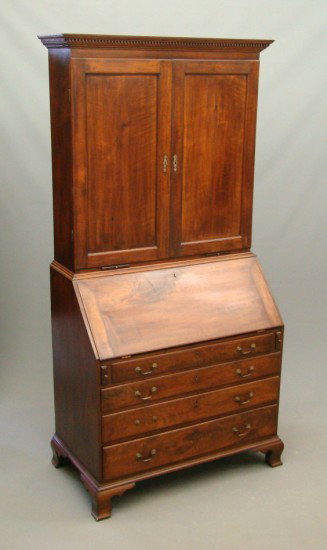 18th c. Chippendale Pennsylvania Walnut Secretary: 18th c. Chippendale Penn. walnut secretary. Top has two paneled doors with shelved interior and dental molded cornice with candle slides below doors. Base has slant lid over four drawers, case raised 