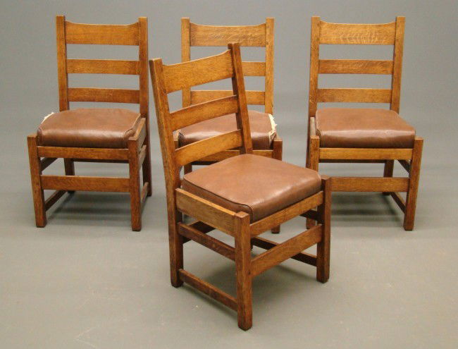 Set Of Four L & JG Stickley Chairs: Set of four signed "L. & J.G." Stickley chairs. 18" Seat Ht. 38" Overall Ht. Top slat on one chair cracked.