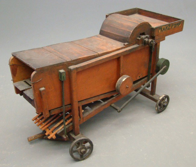 Thrasher Model: Late 19th early 20th c. painted thrasher model. Has name "Franz Pomp" on side. 32" Length 18" Ht.