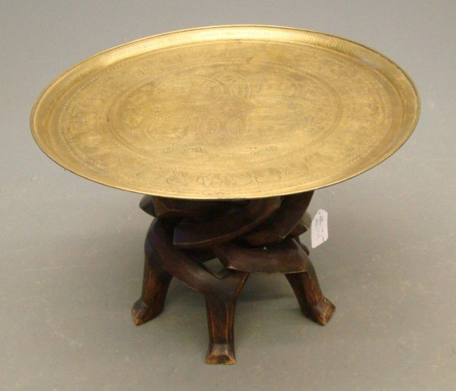 Tray Table: Brass top carved base tray table.