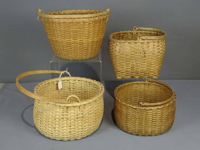 Basket Lot: Lot (4) swing handle baskets. Largest 13" D., 8 1/2" Ht.. Provenance: Estate of Myron & Carolyn Neugeboren Ct..