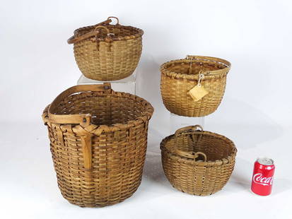 Basket Lot: Lot (4) early swing handle baskets. 13" D., 13" Ht.. Provenance: Estate of Myron & Carolyn Neugeboren Ct..