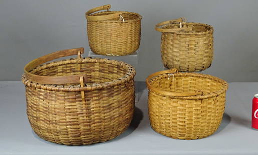 Basket Lot: Lot (4) early swing handle baskets. Largest `15 1/2" D., 10 1/2" Ht.. Provenance: Estate of Myron & Carolyn Neugeboren Ct..