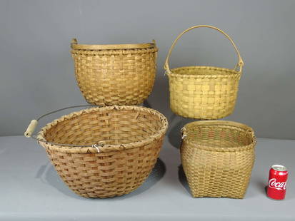 Basket Lot: Lot (4) early swing handle baskets. Largest 17" D., 9 1/2" Ht.. Provenance: Estate of Myron & Carolyn Neugeboren Ct..