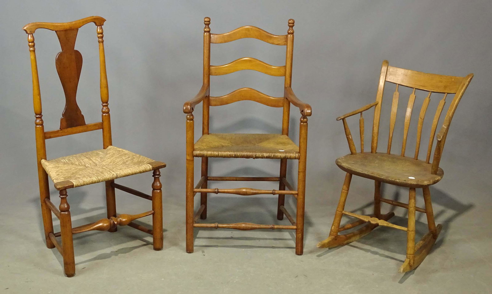 Chair Lot: Lot (3) early chairs including rush seat armchair, thumback rocking chair and Queen Anne chair.