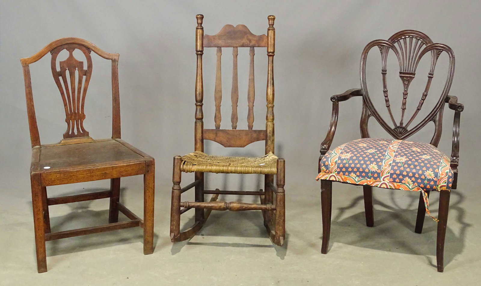 Early Chair Lot: Lot (3) early chairs including Hepplewhite armchair (as found), English Chippendale chair and Queen Anne rocking chair.
