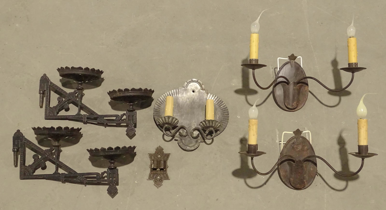 Lighting Lot: Lot including pair sconces, single sconce and iron lamp holders.
