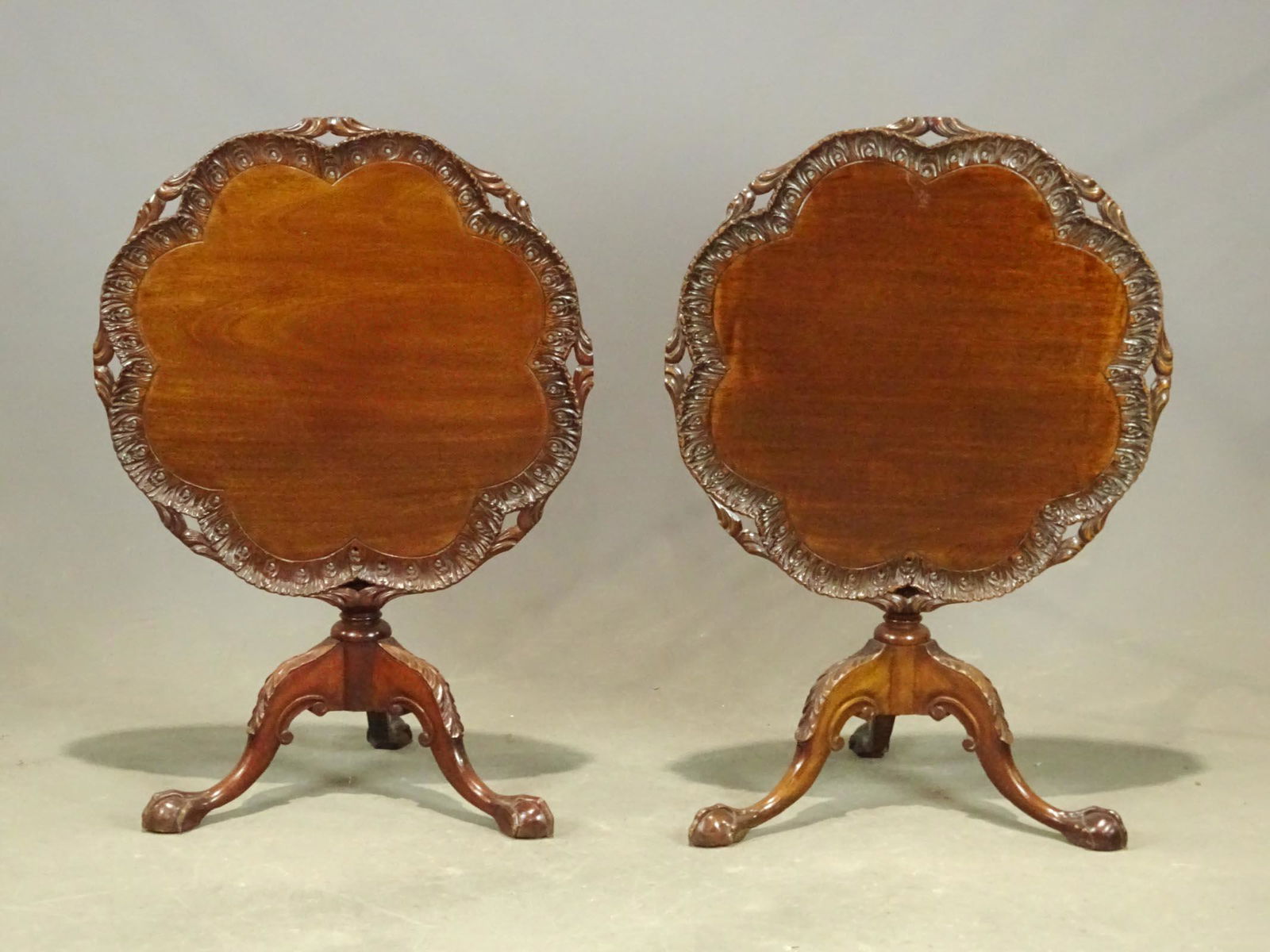 Pair of Tea Tables: Pair of 20th c. Rococo style tilt top tea tables. 30 1/4" Dia. X 28 1/4" Ht..