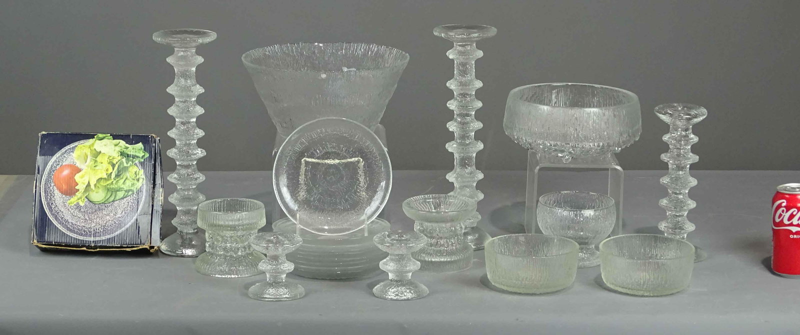 Iittala Finnish Glass Lot: Lot (21) pieces of Iittala Finnish glass by Tapio Wirkkala. Some signed. Along with one original box.
