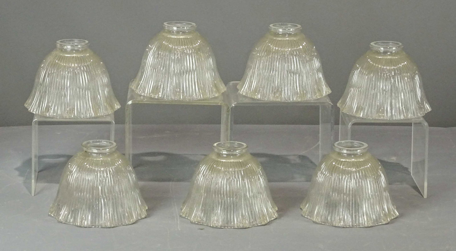 Shade Lot: Lot (7) clear shades. 6" D., 2" opening.
