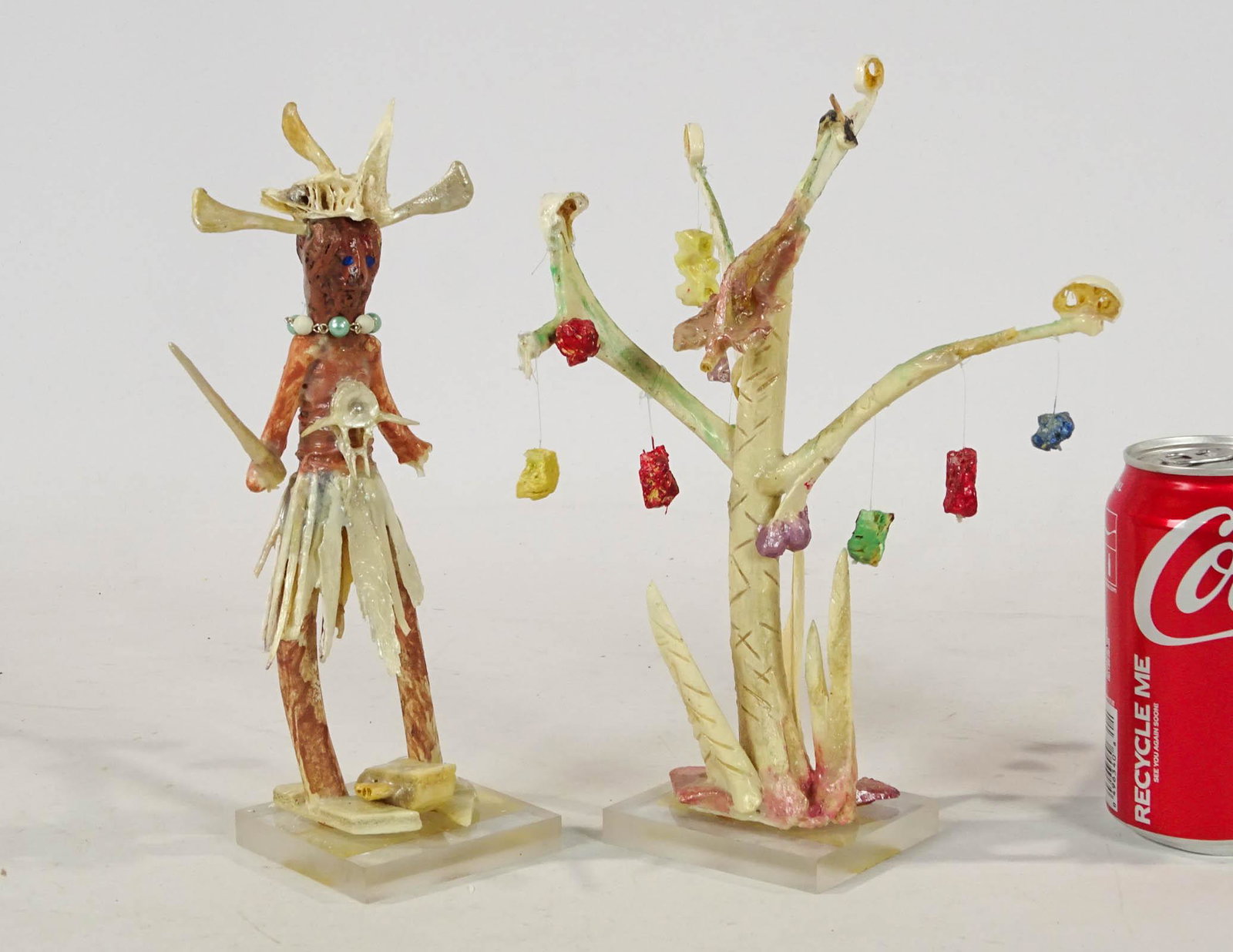 Ollie Smith Outsider Art: Two Ollie Smith Outsider art bone sculptures. Purchased Slotin (Myron Shure collection). Club broke off hand. 2 1/2" x 10" x 2 1/2" x 8 1/2".