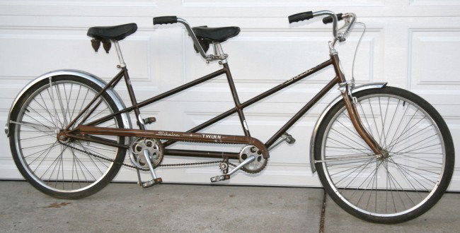 Schwinn Twinn 1970s Tandem Bicycle: Schwinn Twinn 1970s Tandem Bicycle. Completely original including tires, pedals, saddles and grips. Paint is pretty good but shows typical wear with some scratches and chips. Stainless fenders.