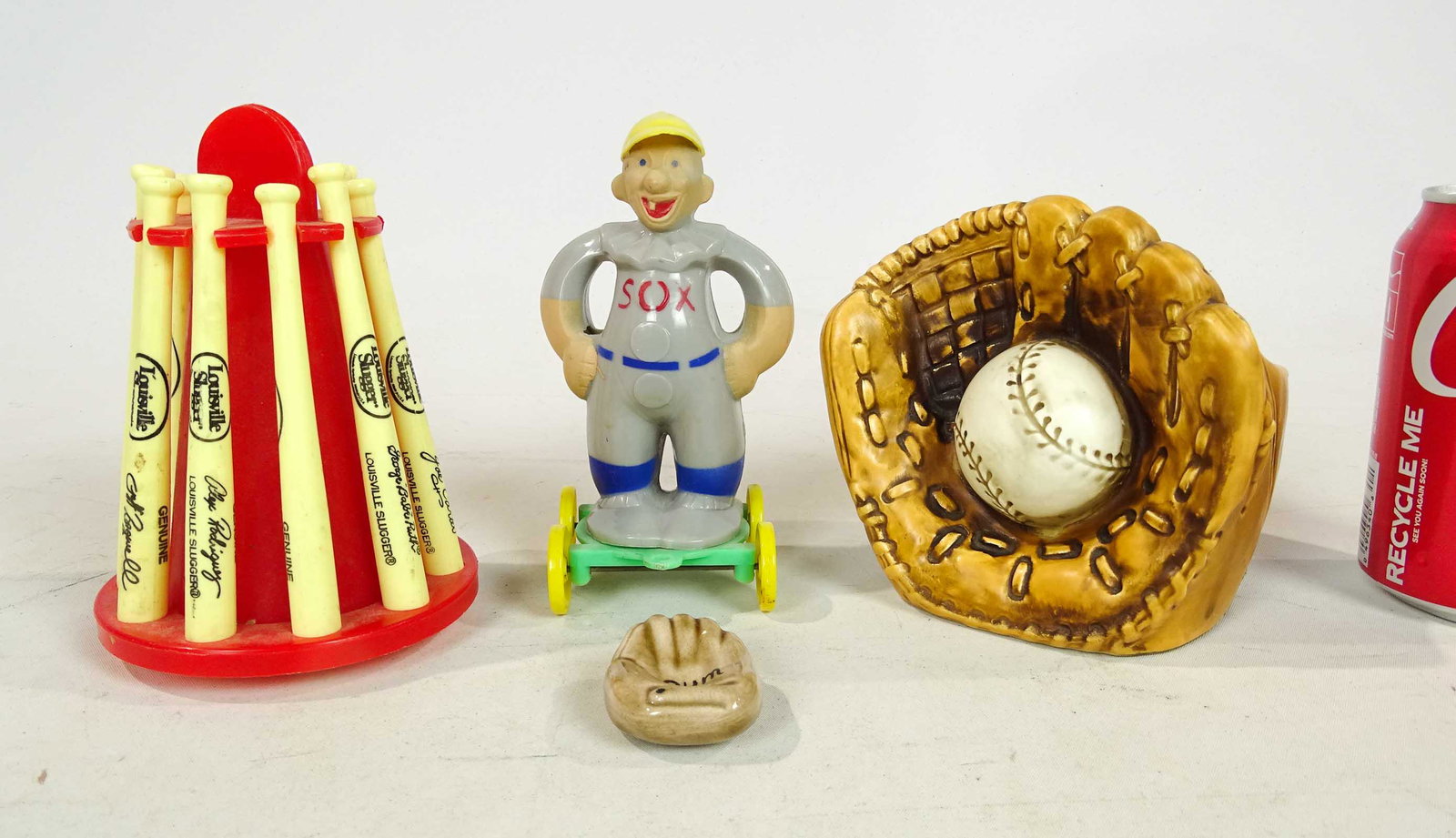 Baseball Related Lot: Lot including plastic Louisville Slugger bank (5 1/2" Ht.), "Sox" toy (6" Ht.), (2) pieces of pottery.