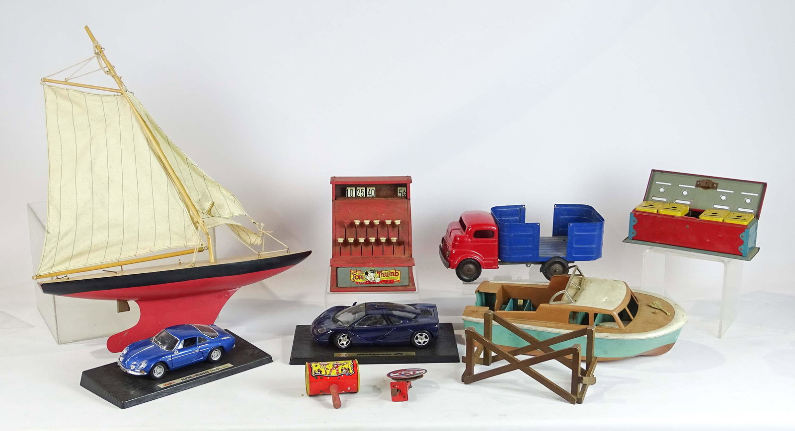 Misc. Lot: Lot including model boats (largest 22" L.), Home Budget Bank, (2) model cars, toy cash register, pressed steel truck (12 1/2" L.), (2) noise makers.