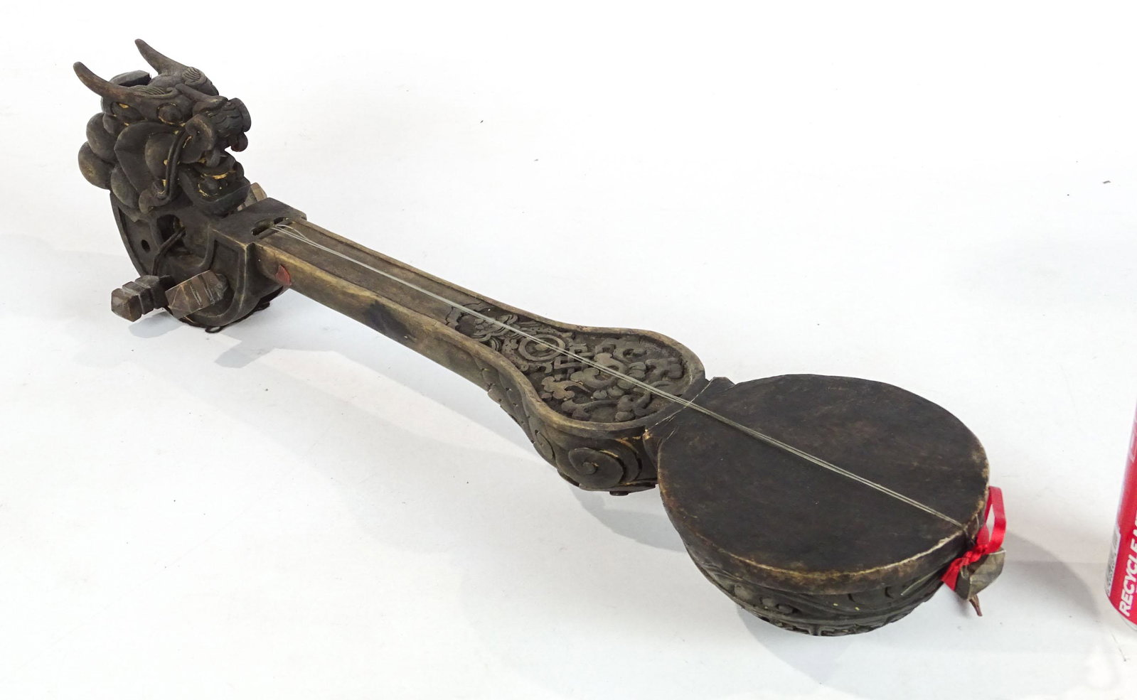 Ethnic Wooden Instrument: Ethnic wooden carved instrument. 21" L..