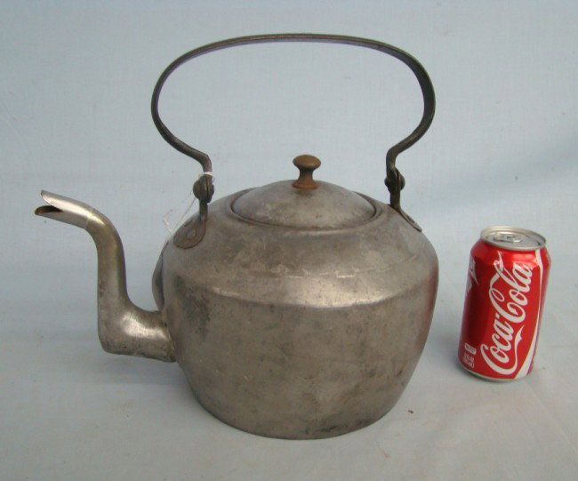 19th c. Tea Kettle Signed Whitfield: 19th c. sheet iron kettle having wrought iron handle. Signed "Whitfield" (Thos. Whitfield Blacksmith and Sheet Iron Works, Paterson New Jersey). C. 1840-60. 10 1/2" Ht. Note five dots on handle repres
