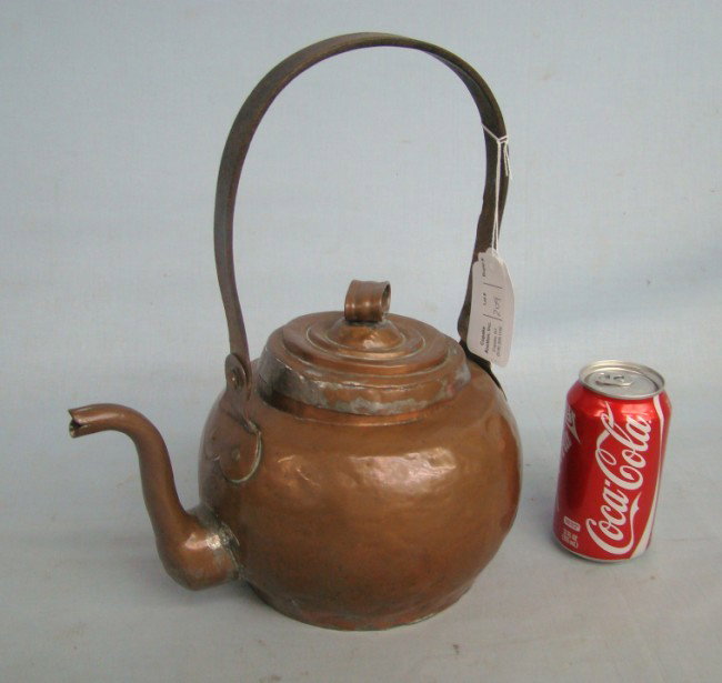 18th c. Dutch Tea Kettle: 18th c. Dutch copper tea kettle with wrought iron swing handle. 13" Ht.