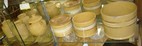 19th c. Yelloware Lot: Lot seven pieces 19th c. yelloware including covered jars and butter dishes. All as found.