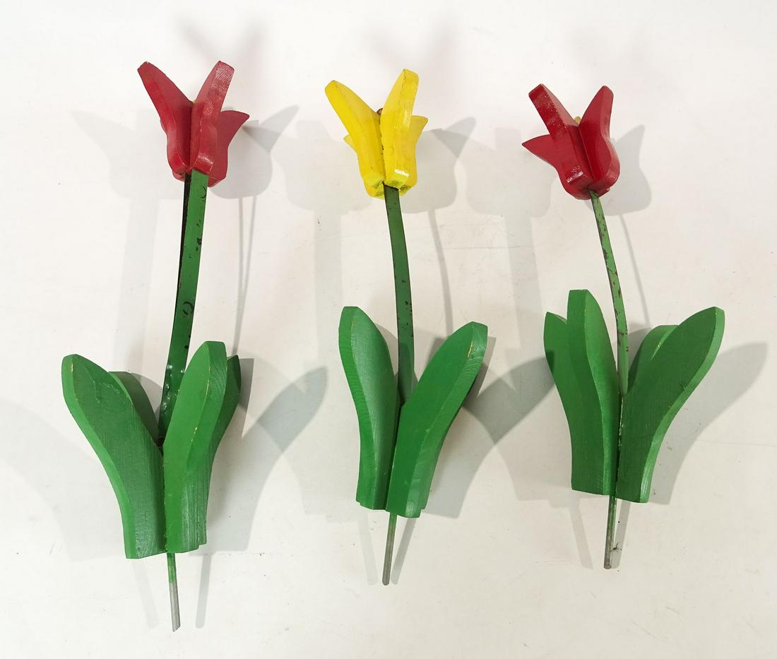 Yard Flowers: Three painted wood and metal folk art yard flowers. 22" L..