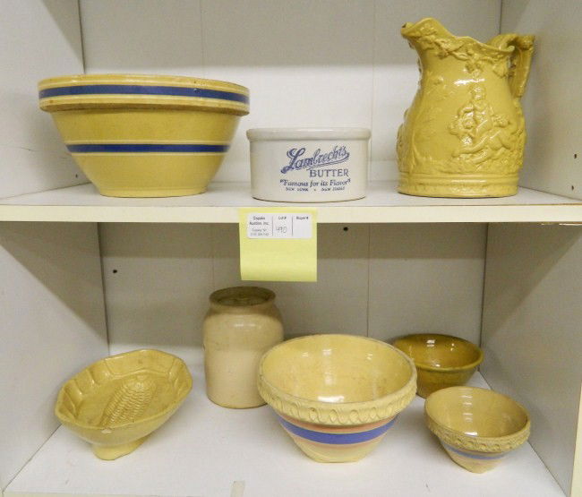 Yelloware Lot: Lot eight pieces yelloware including figural pitcher, "Lambrechts Butter" crock, corn mold etc.