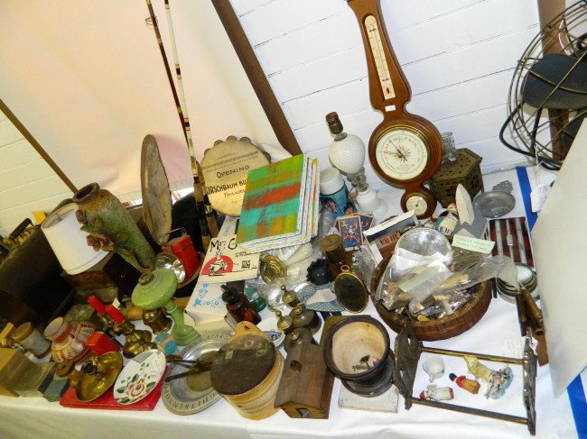 Misc. Table Lot: Lot over 40 pcs. misc. items including sewing machine in case, mottled glass oil lamp, fishing poles, barometer, candleholders, Southwest vase, signed and dated "Opening Kirschbaum Building Philadelph
