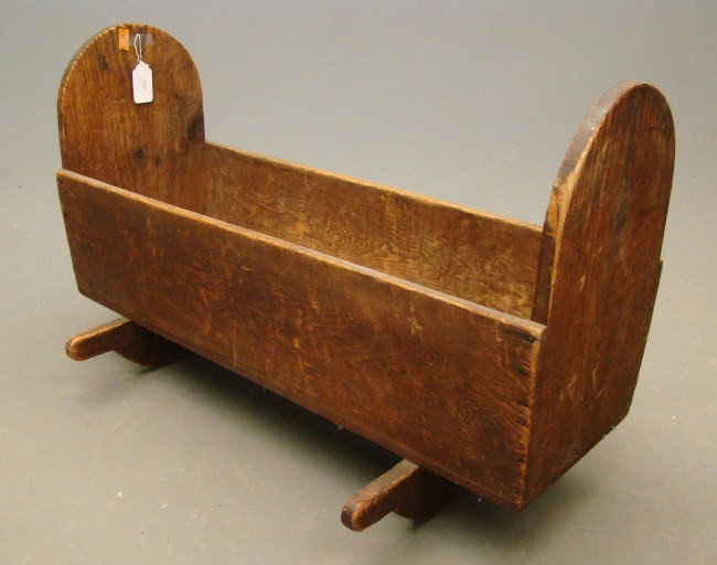 19th c. Cradle: 19th c. primitive cradle. 36" Length.