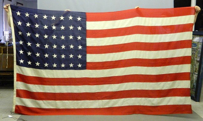 48 Star Flag: Vintage 48 star flag in very good condition. Labeled "Sterling Reg. US Pat.Off. Allwool Double Warp Bunting".