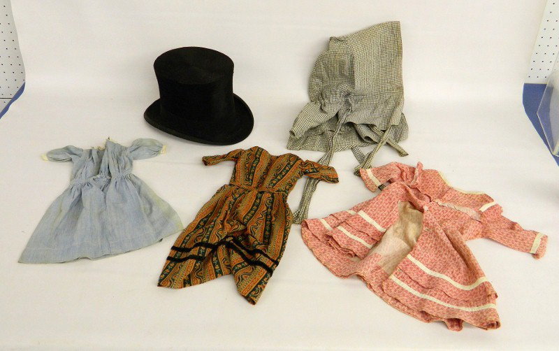 Clothing Lot: Lot including 19th c. top hat, 19th c. bonnet and three 19th c. doll dresses.