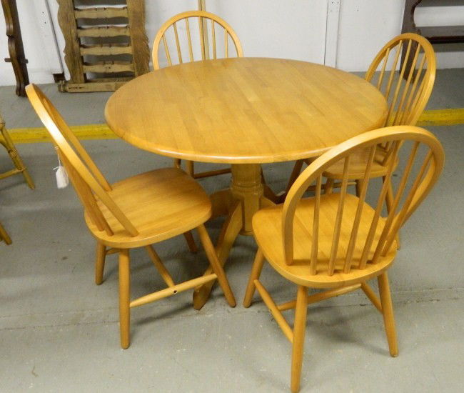 Table And Chairs: Contemporary round top table and four chairs.