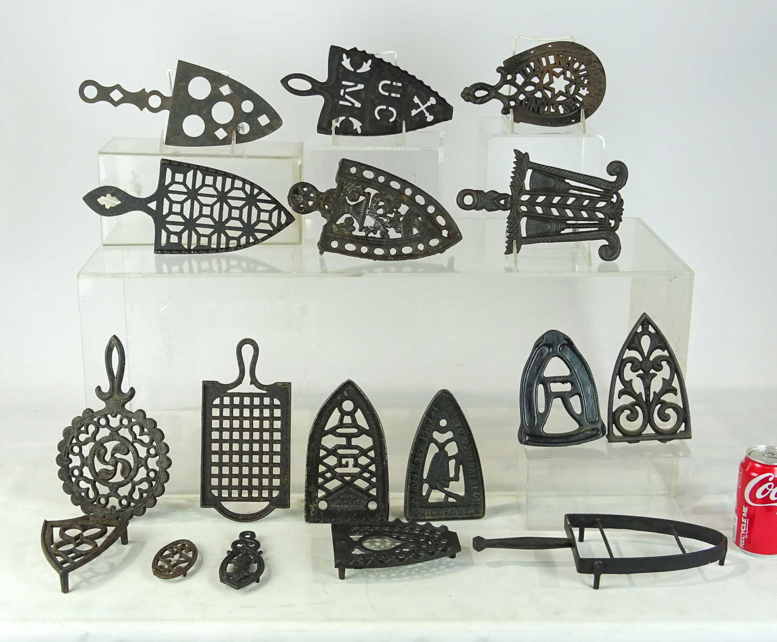 Sad Iron Trivets: Collection of (17) sad iron trivets.