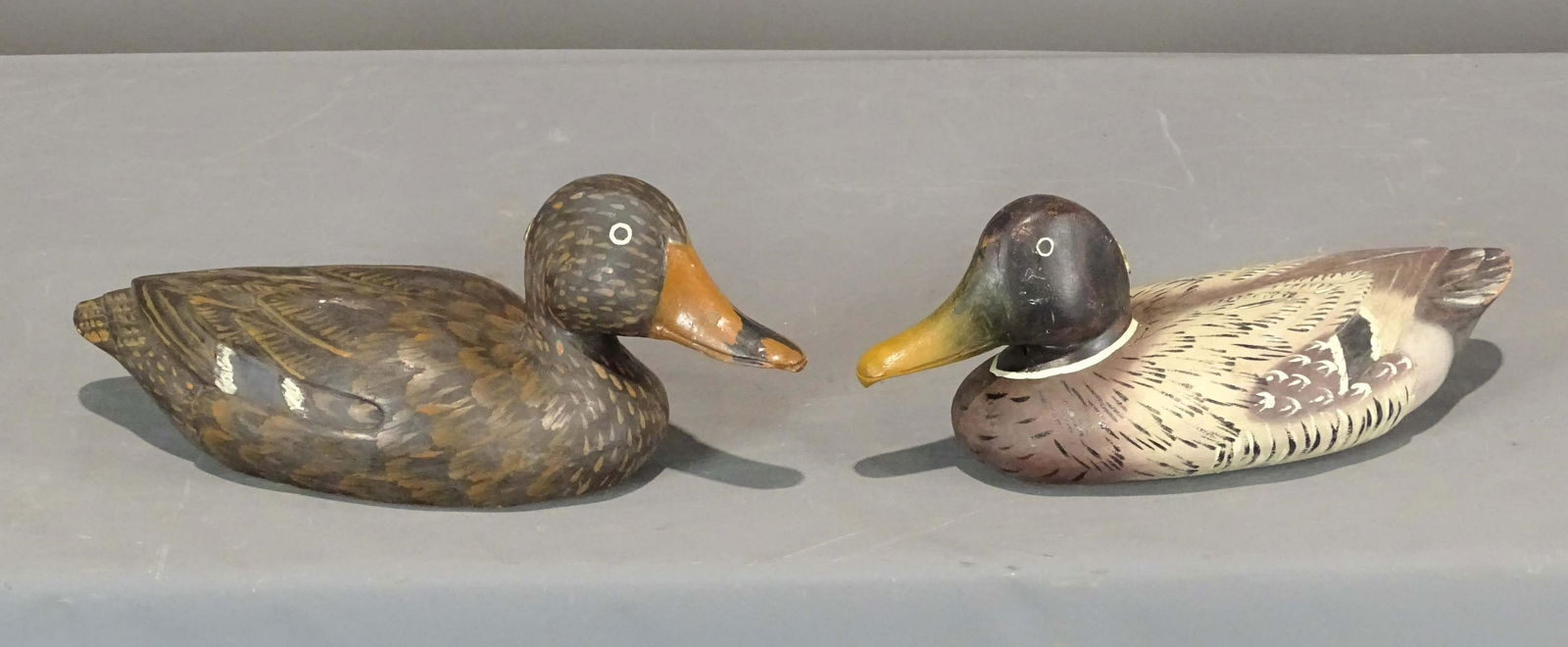 Decoy Lot: Lot (2) painted carved wooden decoys. 14" L..