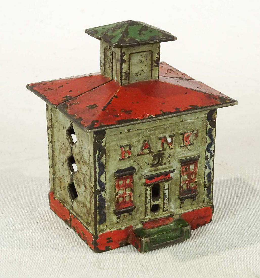 Cupola Bank: Cast iron Cupola bank. 3 1/4" Ht., 1872, Mfg. J & E. Stevens, #1147 Penny Bank Book.