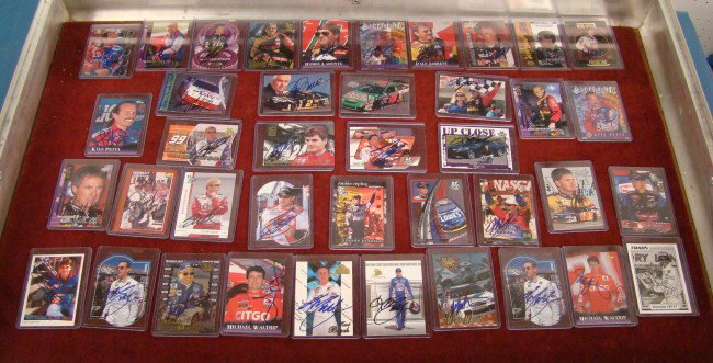 Nascar Trade Cards: Collection of 40 signed Nascar racing trade cards. Mostly "Press Pass". Some names to include Richard Petty, Kyle Petty, Tony Stewart, Tony Labonte, Kurt Busch, Jimmie Johnson, Mark Martin, Penske and