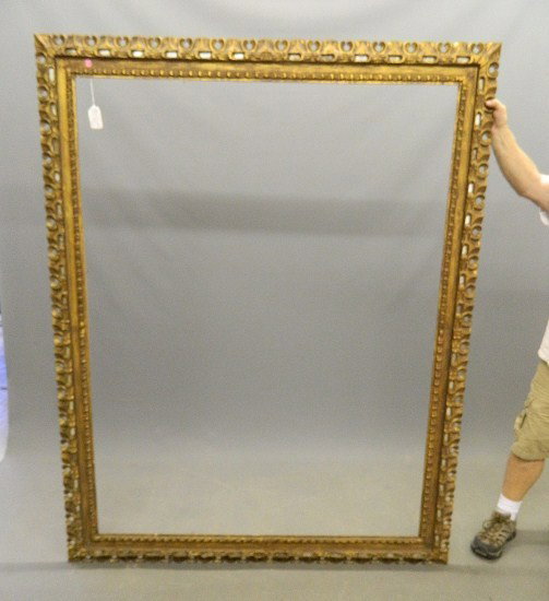Frame: Large carved frame. Site 62 3/4" x 48". Has older Christies sticker on back.